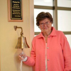 Lois Gulbrandsen rings the bell on her last day of treatment.